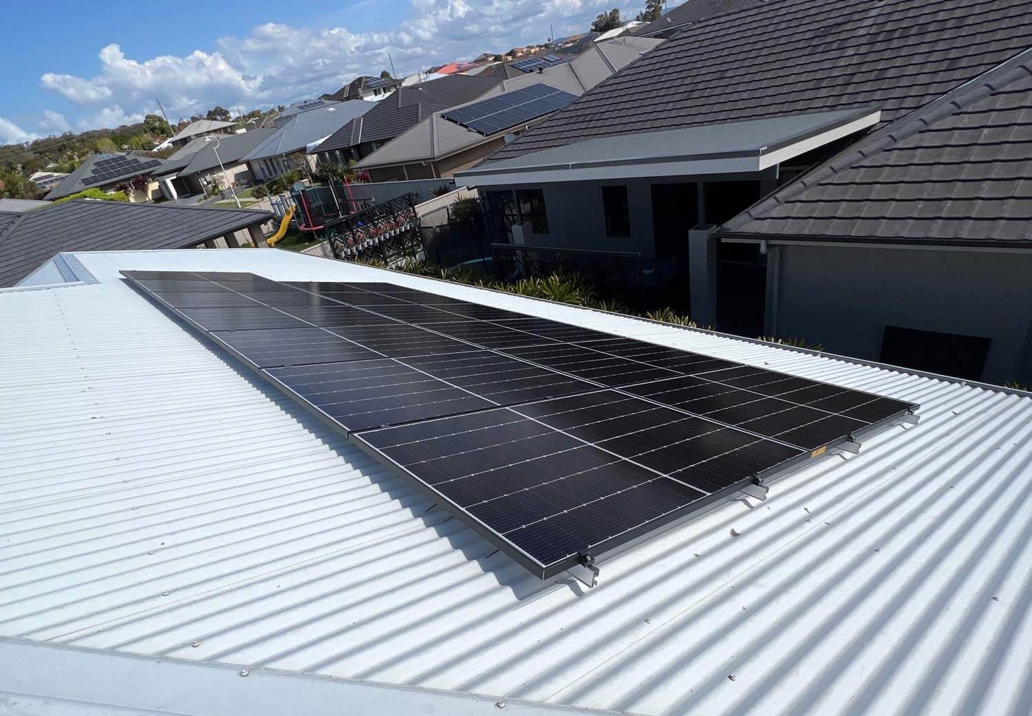 5kW system installed on rooftop with 14kw battery in garage